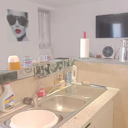 Maison De A